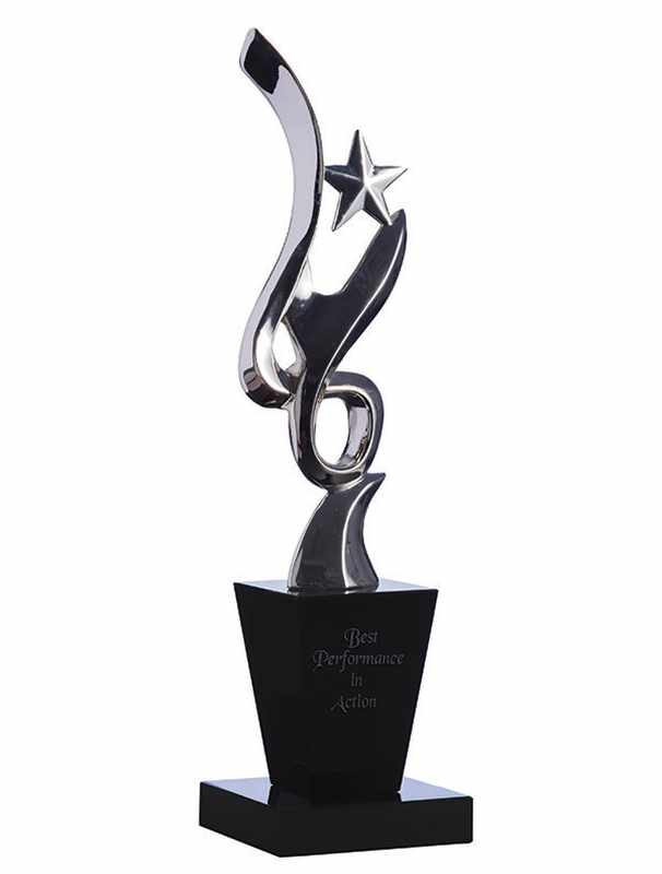 Silver figurine on black crystal base